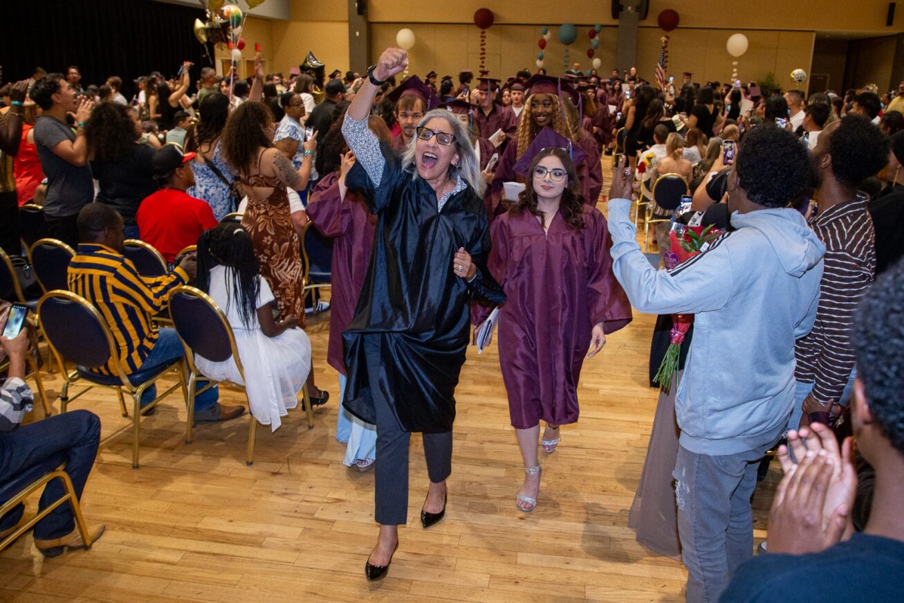 TUVA grads are cheered on as they walk into the ceremony