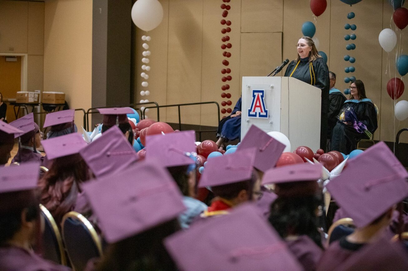 TUVA's principal speaks while grads listen in