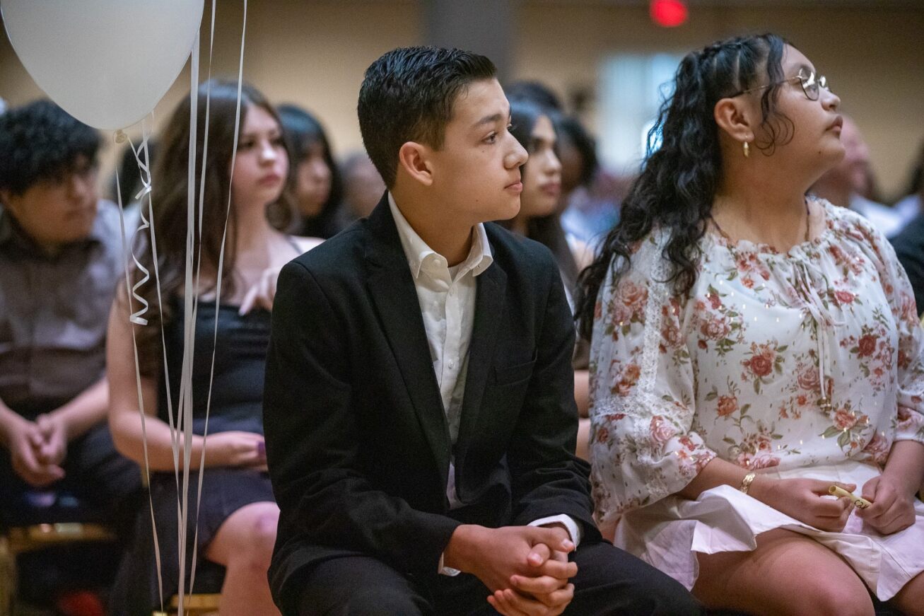 TUVA 8th graders listen during the ceremony