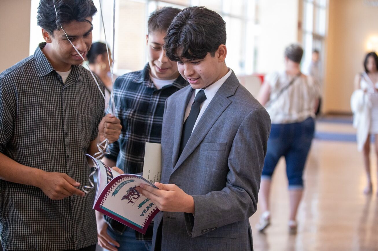 TUVA 8th graders look through the program