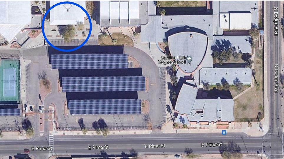 View from overhead of Catalina High school showing the TUVA building directly north of the parking shade structures.