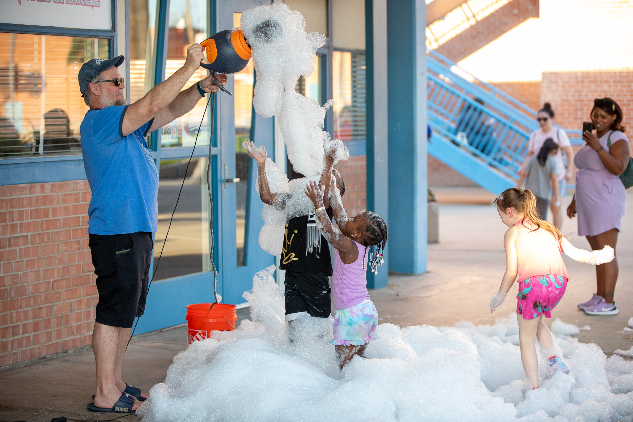 TUVA students have a blast playing in foam!